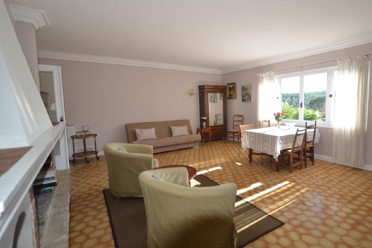 Apartment 3 living area with dining table